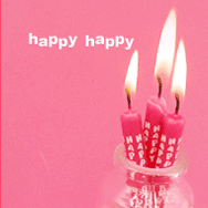 Happy happy: pink birthday candles burning