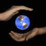 globes with hand