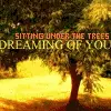 sitting under trees