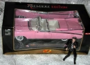 elvis and his pink car