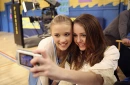 Miley Taking A Picture With Emily Osment