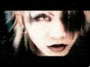 Kyu from Dir en Grey licks his lips