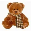 girl hugging teddy bear