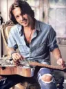 Johnny Depp playing guitar