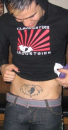 Pete looking @ his tattoo