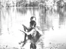 Baptizing in Cheniere Lake, Louisiana