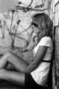 Girl sitting on the wall