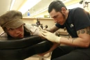 Ryan Ross getting a tattoo