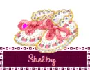 Shelby name with pink baby booties