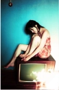 Sitting on the tv