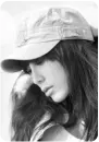 girl with a cap thinking
