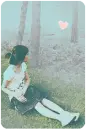 girl sitting on the grass
