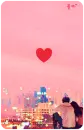 lovers looking at the city buildings
