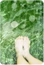feet in the water