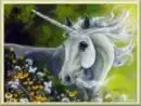 unicorn looking at flowers