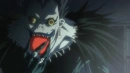 Ryuk enjoying an apple.