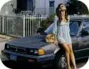 Girl Sitting on a Car