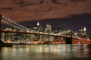 Manhattan and bridge at night