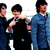 Nick making the peace sign