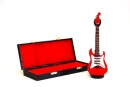 Red guitar with case