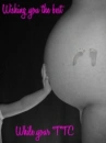 Child's Hand Pregnant Belly