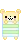 yellow bear sleeping with green blaket