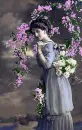 vintage pic of lady standing by flowers