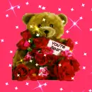 teddy bear with flowers
