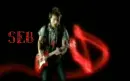 Seb playing the guitar