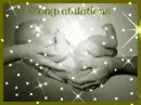 two hands holding a baby