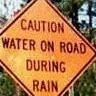 Caution! Water on Road During Rain