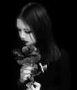 Girl with rose of black