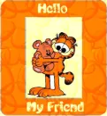 garfield hugging a teddy bear