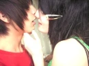 Emo boy and Emo girl kissing.