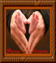 mothers hands and baby feet