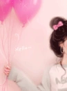 cute pink girl with baloons