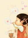 Baby girl playing with bubbles