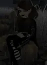 Autumnreignn sitting in the pumpkin patch