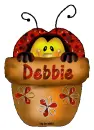 Lady bug in flower pot with Debbie name