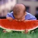 baby eating watermelon