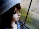 dOll wearing blue hat 