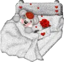 bear in bed with rose