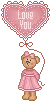 teddy bear holding balloon