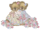 two teddybears with flowers