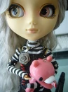 a doll with a gloomy bear