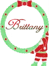 Brittany with Santa Holding Wreath