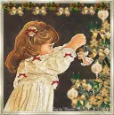 Little Girl Decorates Christmas Tree
