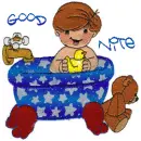 Boy in bathtub with rubber duckie