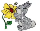 rabbit smelling a flower
