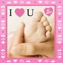 babys foot in a hand